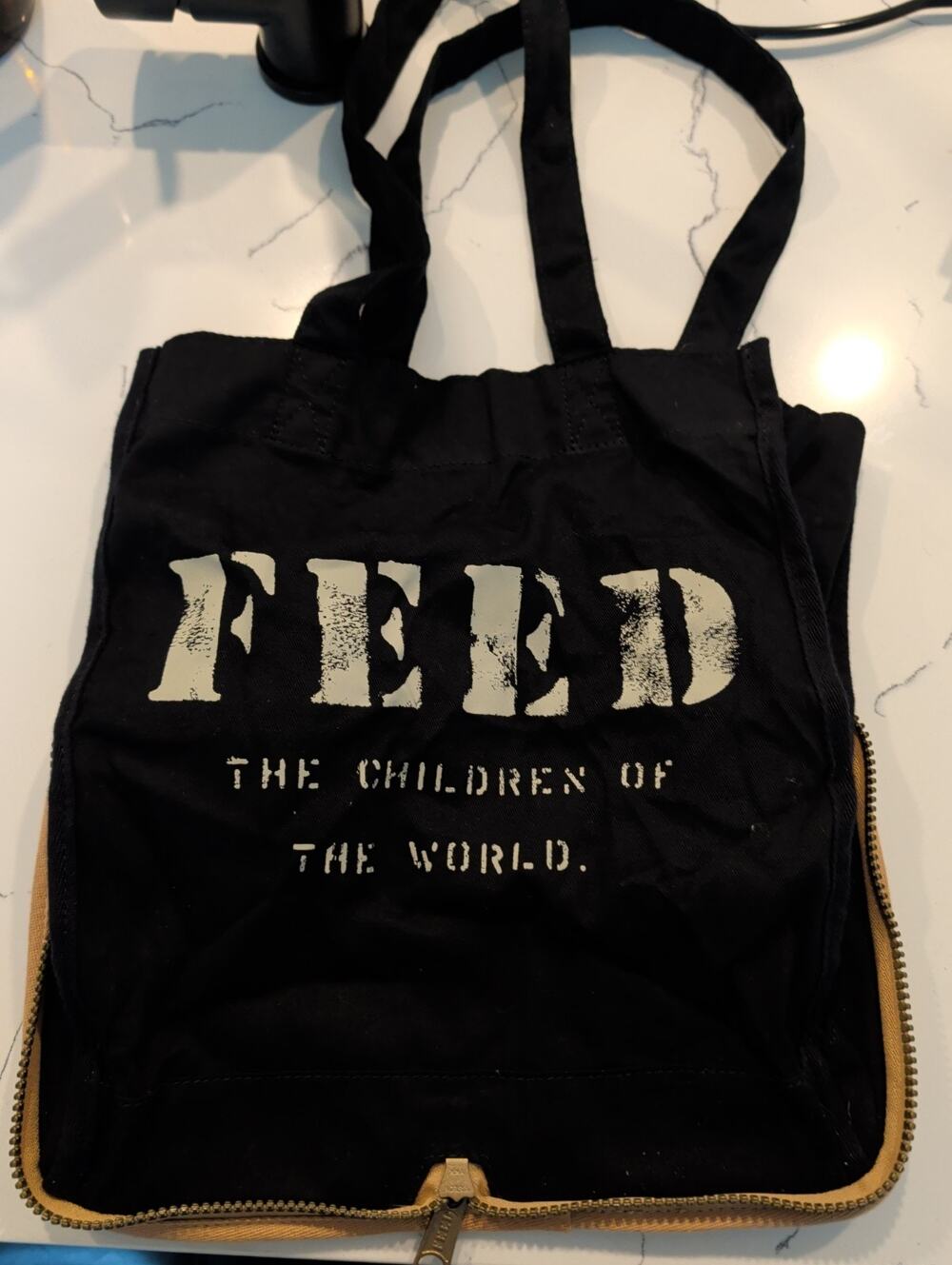 FEED Projects Black Canvas Packable Zip Tote Bag Eco Friendly Reusable Travel